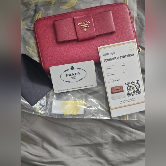 Prada Handbags - Prada Pink Wallet with Bow Detail